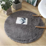 tapis rond doux fourré couleur unie moderne rose marron vert violet beige
