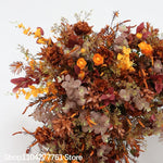 décoration événement mariage arc floral composition feuilles branches rustique automnale