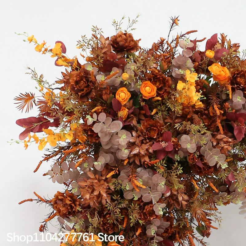 décoration événement mariage arc floral composition feuilles branches rustique automnale