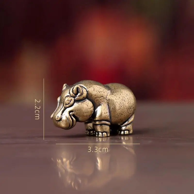 figurines animales bronze cuivre détails sculptés rhinocéros hippopotame éléphant plateau bois africain