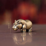 figurines animales bronze cuivre détails sculptés rhinocéros hippopotame éléphant plateau bois africain