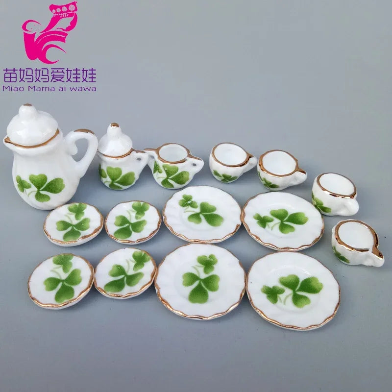service thé miniature blanc doré rose bleu vert fleurs classique tasse théière soucoupe assiette