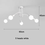 suspension lumineuse moderne minimaliste noir or blanc branches incurvées métal fixation ampoles led