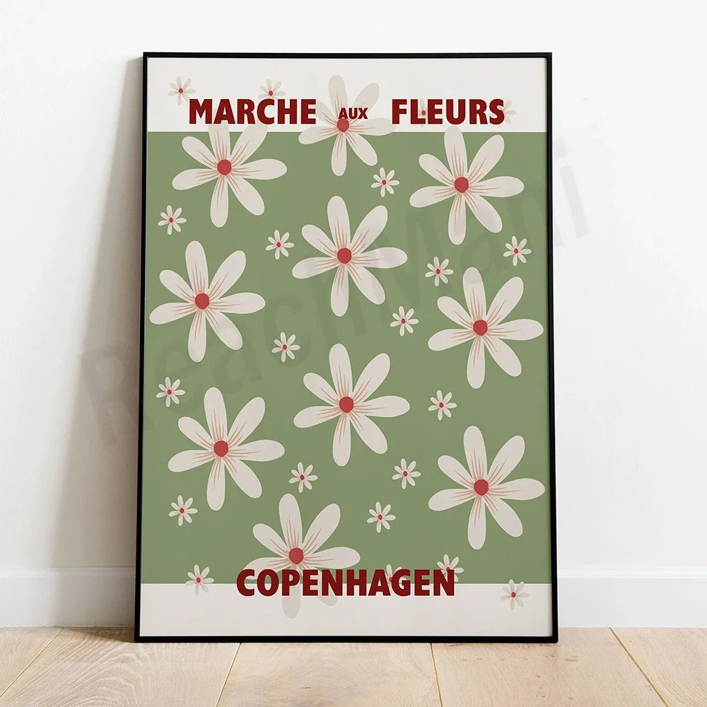 Marché aux fleurs de Copenhague avec des fleurs blanches sur un fond vert.