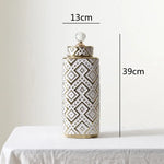 vases décoratifs modernes motifs géométriques or blanc couvercle transparent élégants intérieurDecoration
