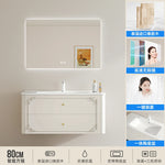 meuble salle bain noir blanc tiroirs vasque ornements dorés classique fixations murales accessoires cosmétiques