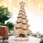 Figurines pain d'épice sur arbre de Noël