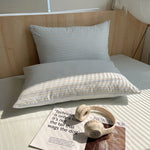 lot taies d'oreiller coton rayures rose clair modernes minimalistes douces lit maison