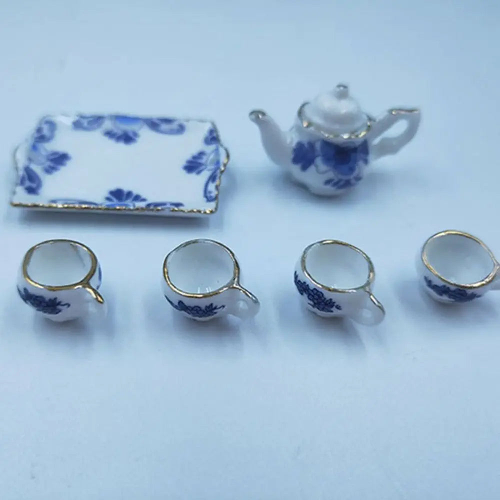 service thé miniature blanc bleu fleurs classique théière crème sucrier tasses assiettes