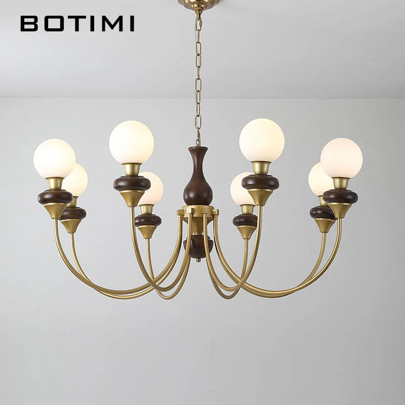 lustres modernes chandelier or marron foncé ampoules led globes opaques éléments décoratifs
