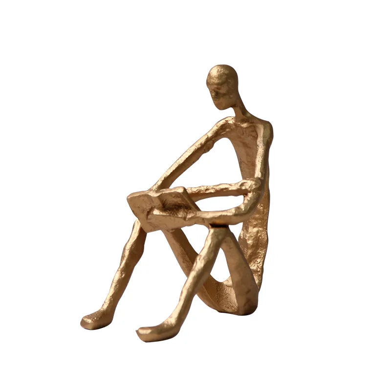 statuette moderne minimaliste or noir texture rugueuse stylisée acrobatie décoration pièce ornement figure