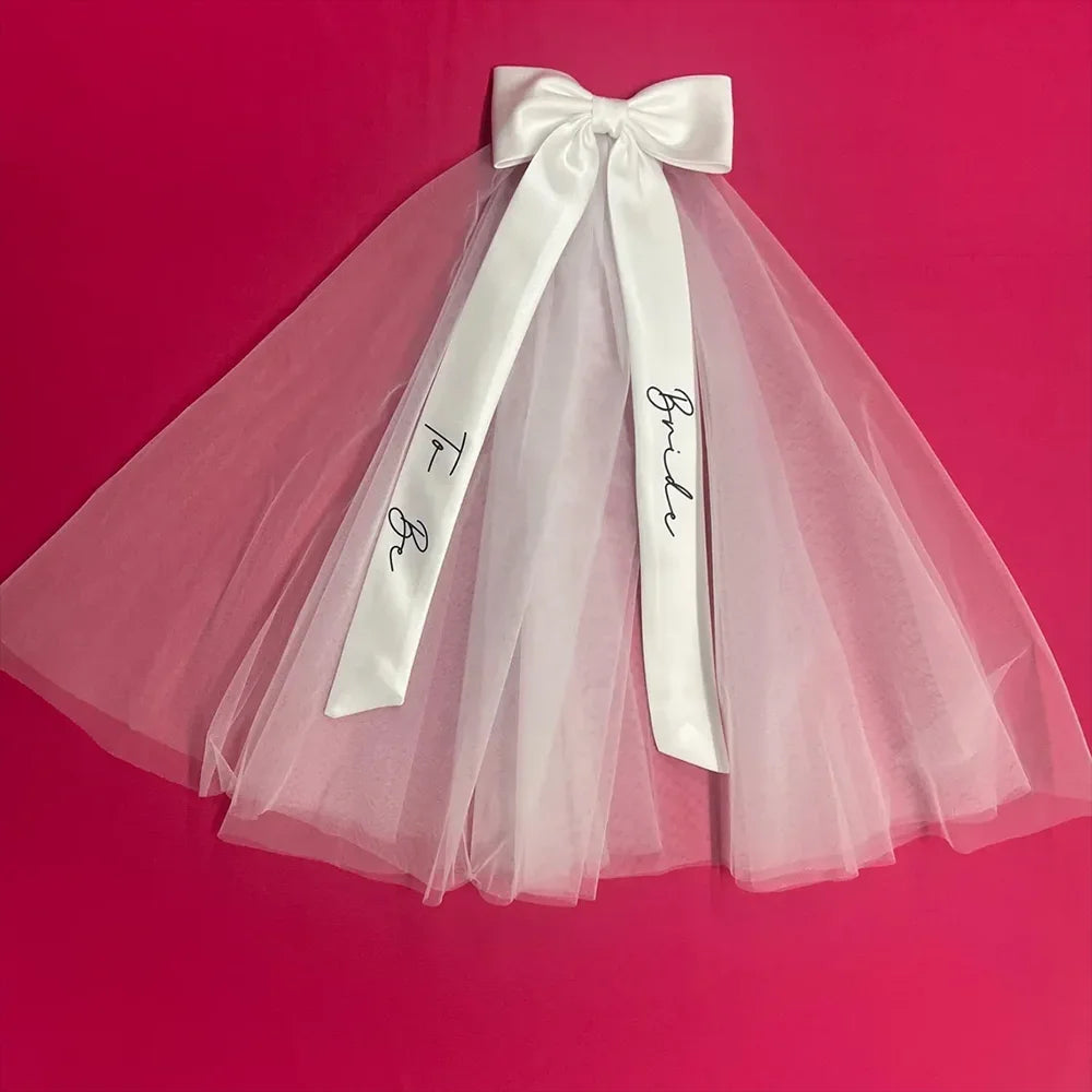 voile mariée tulle transparent BRIDE lettres brillantes blanc rose ruban noeud