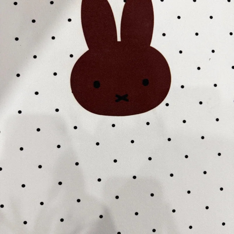 tapis sol absorbant rapide anti dérapant salle bain blanc noir points noirs visage lapin
