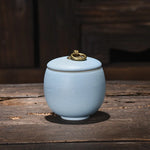 pot thé céramique classique poignée métallique couvercle texture grainée décoratif