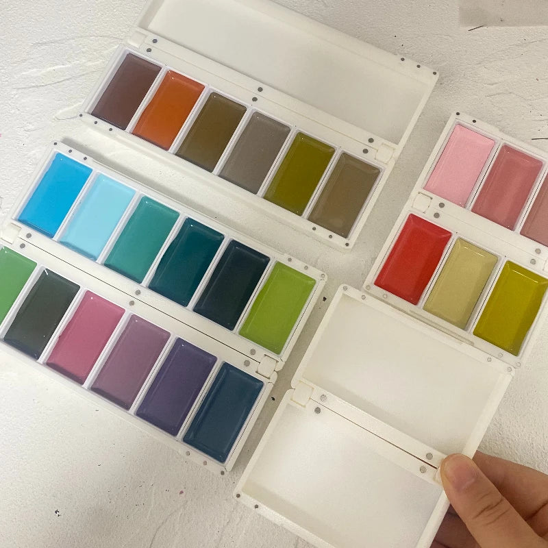 palette pliante peinture aquarelle portable plastique diverses couleurs artistique creatif translucide charnières