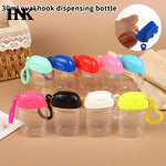 bouteilles rechargeables transparentes modernes couleurs variées anneaux boucles pratique mini désinfectant main cosmétique alcool