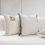 coussin géométrique laine coton contemporain beige gris noir décoratif sofa lit voiture