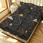ensemble literie moderne drap housse bleu foncé gris doré motifs triangles taies oreillers adultes