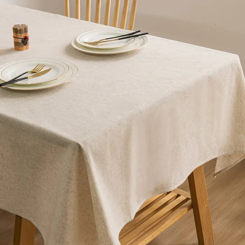 nappe réutilisable polyester texture lin beige table fête scandinave minimaliste rustique assiettes chaises