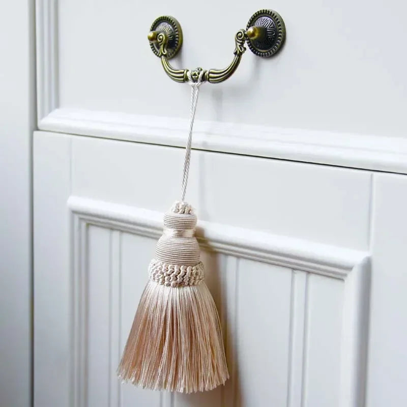 pompon porte couleur beige noir marron gris rose bohème chic décoration maison textile polyester