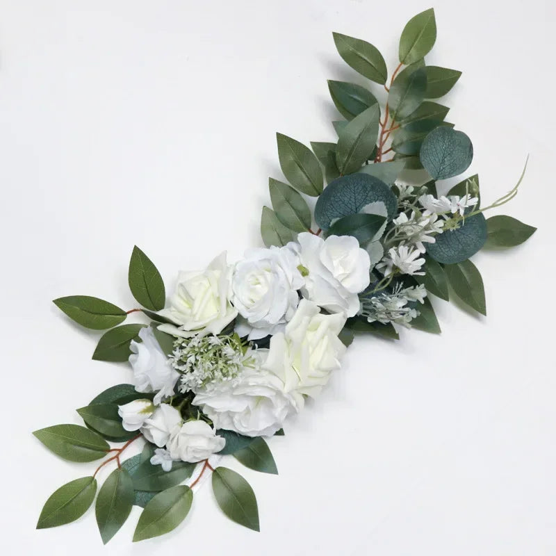 arche decorative mariage fleurs roses blanches feuilles vertes tissu transparent bouquets romantique champetre