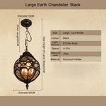 Lampe suspendue artisanale bronze noir ornements géométriques transparente vintage chambre salon