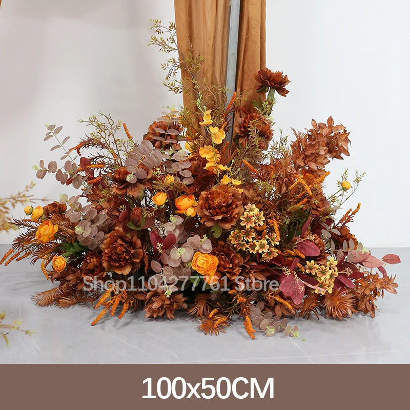 décoration événement mariage arc floral composition feuilles branches rustique automnale