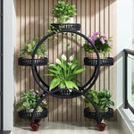 meuble plante rotatif moderne niveaux métal ajouré noir roulettes freinées balconintérieur