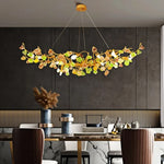 suspension lumineuse moderne dorée branches pierres couleur blanc orange vert