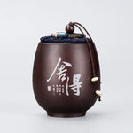 pot thé marron imprimé floral couvercle texte blanc classique traditionnel cordon boule bois épices