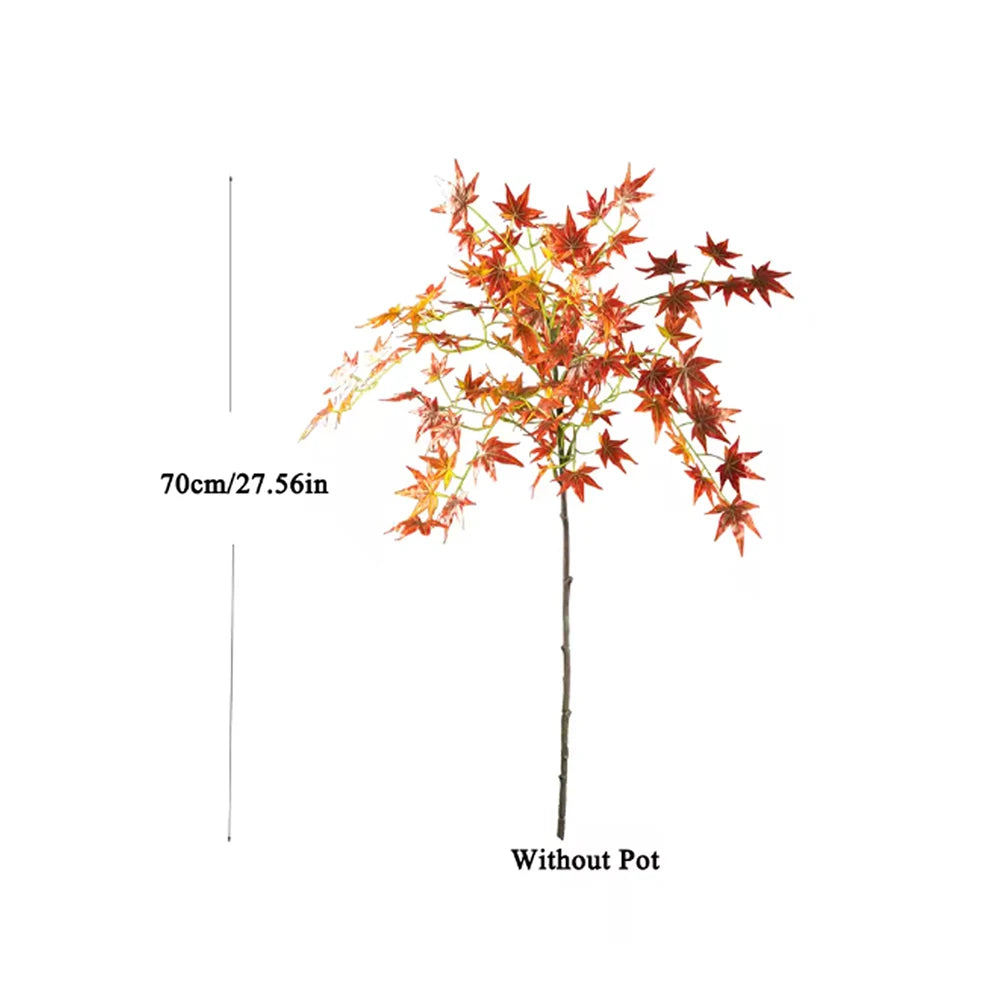plante artificielle arbuste feuilles vertes feuilles pointues tronc droit pot beige décoration intérieure moderne