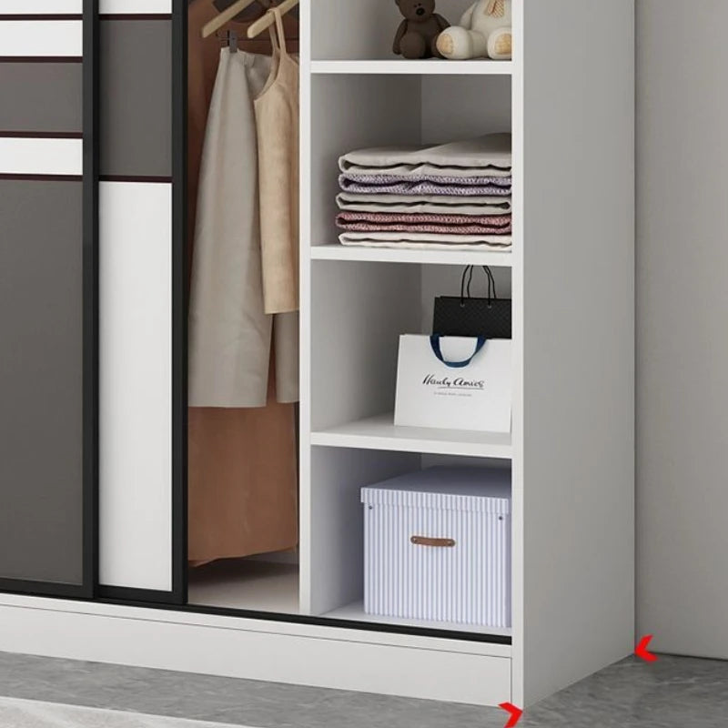 armoire moderne minimaliste blanc gris panneaux rectangulaires vêtements suspendus boîtes rangement jouets poignées porte