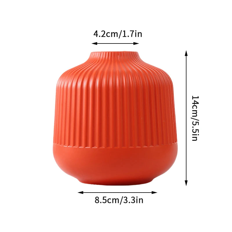 vases modernes orange blanc vert rayures horizontales opaques décoration intérieure papier bougie fleurs artificielles