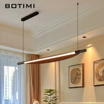 lampe suspendue moderne noire bois naturel texture bois chambre salon étude