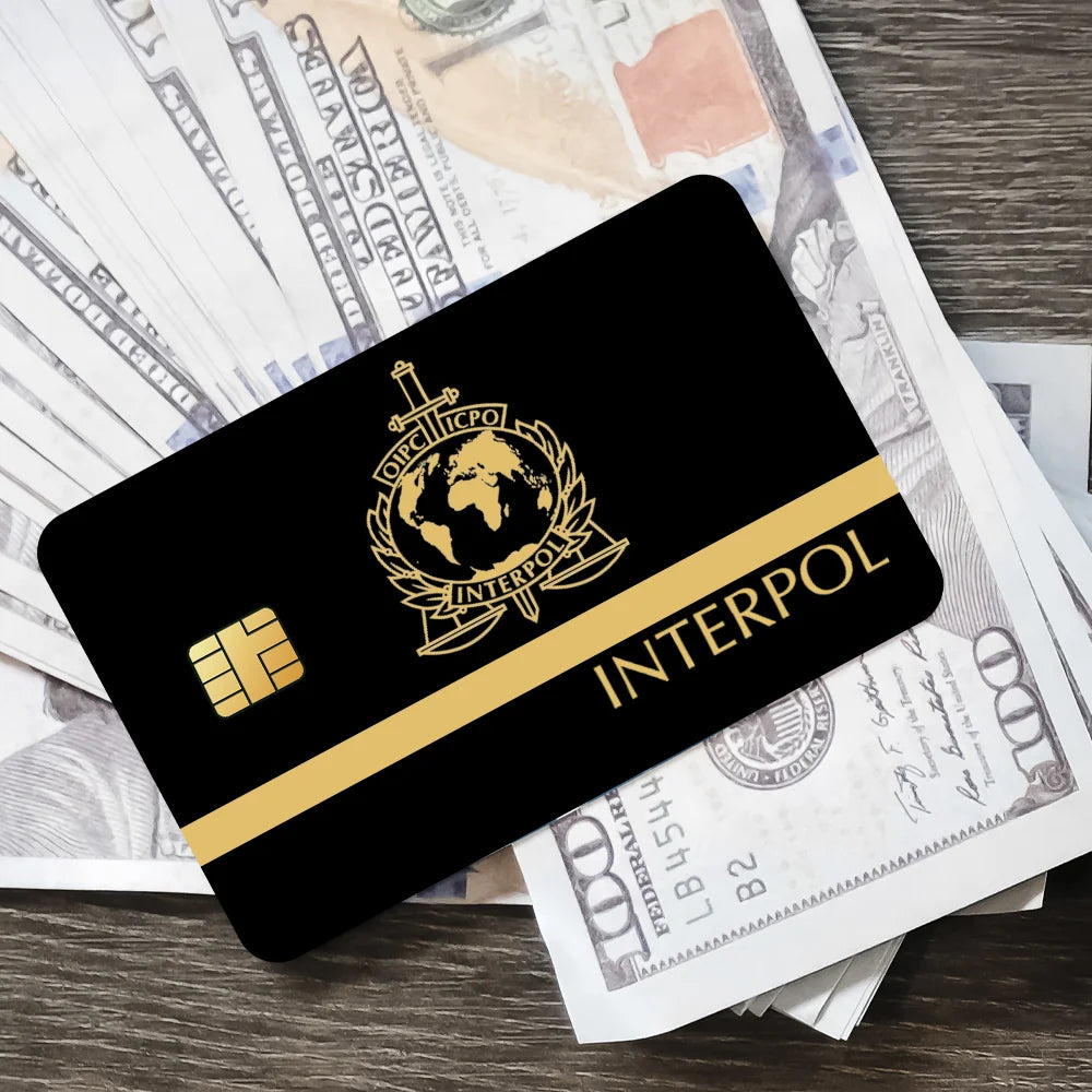 stylo bille bleu interpol logo globe épée carte bancaire