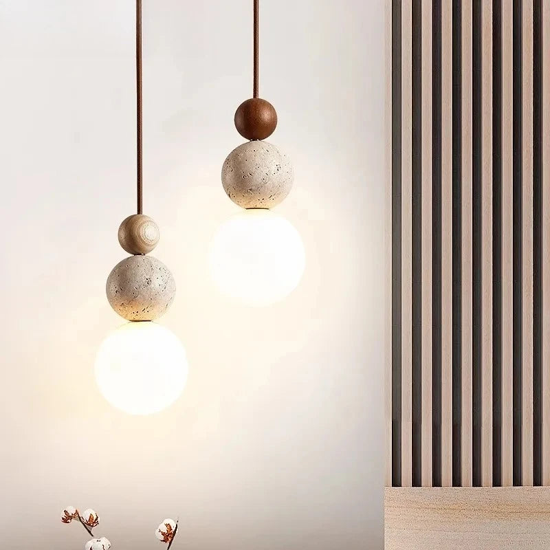Suspension lumineuse moderne pierre gris beige brun clair texture granulée câble noir salon chambrehôtel