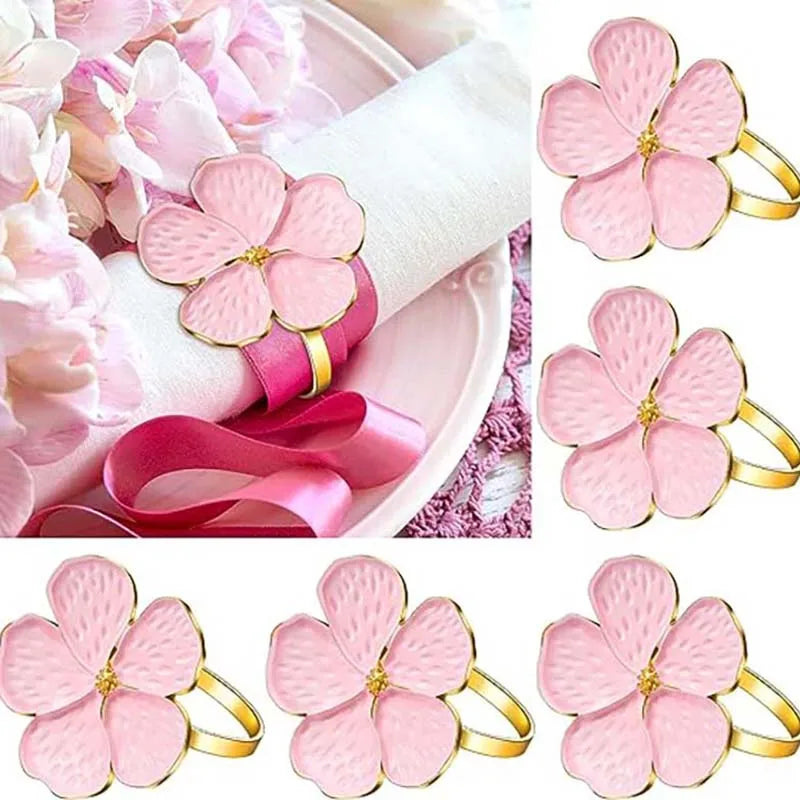 anneaux serviettes métal rose fleurs stylisées décoration table moderne élégante événement noël