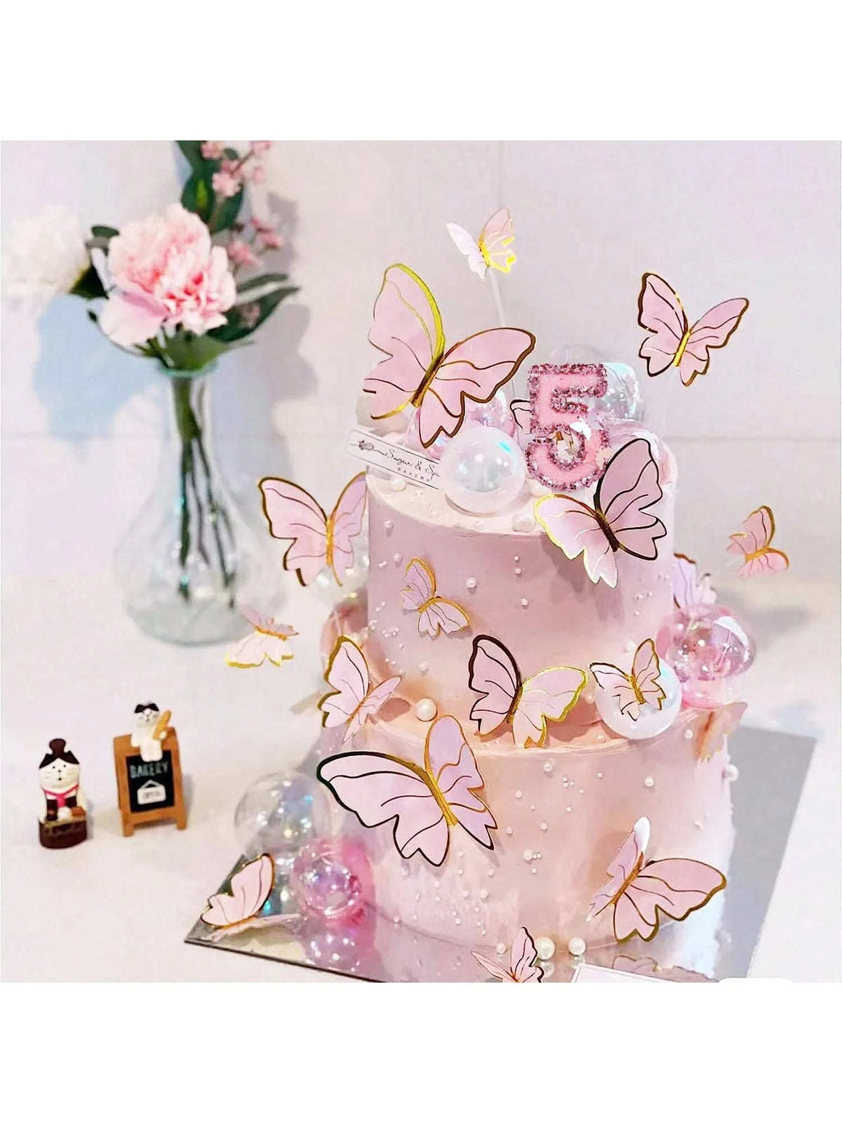 bougies gâteau anniversaire numérotées paillettes papillons rose doré festive decoration tringle