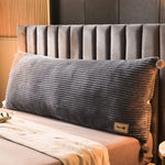 coussin tête lit gris rayures horizontales moderne fixé deux pompons blancs confortable coton polyester