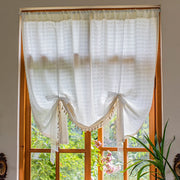 rideau bohème blanc crème tissé transparent motifs carrés franges liens ruban
