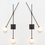 lampe murale moderne minimaliste noir doré blanc fixée plaque carrée globes sphériques tiges métalliques