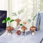 vases champignons rose moderne rayures verticales transparents décoration intérieure minimaliste