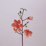 décoration intérieure branche magnolia artificielle fleurs rose blanches naturel salon maison événements