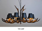 lustre rustique vintage têtes antlers noirs marron clair salon salle manger