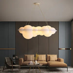 luminaire suspendu nuage moderne sphères lumineuses transparence partielle minimaliste fixations câbles métalliques