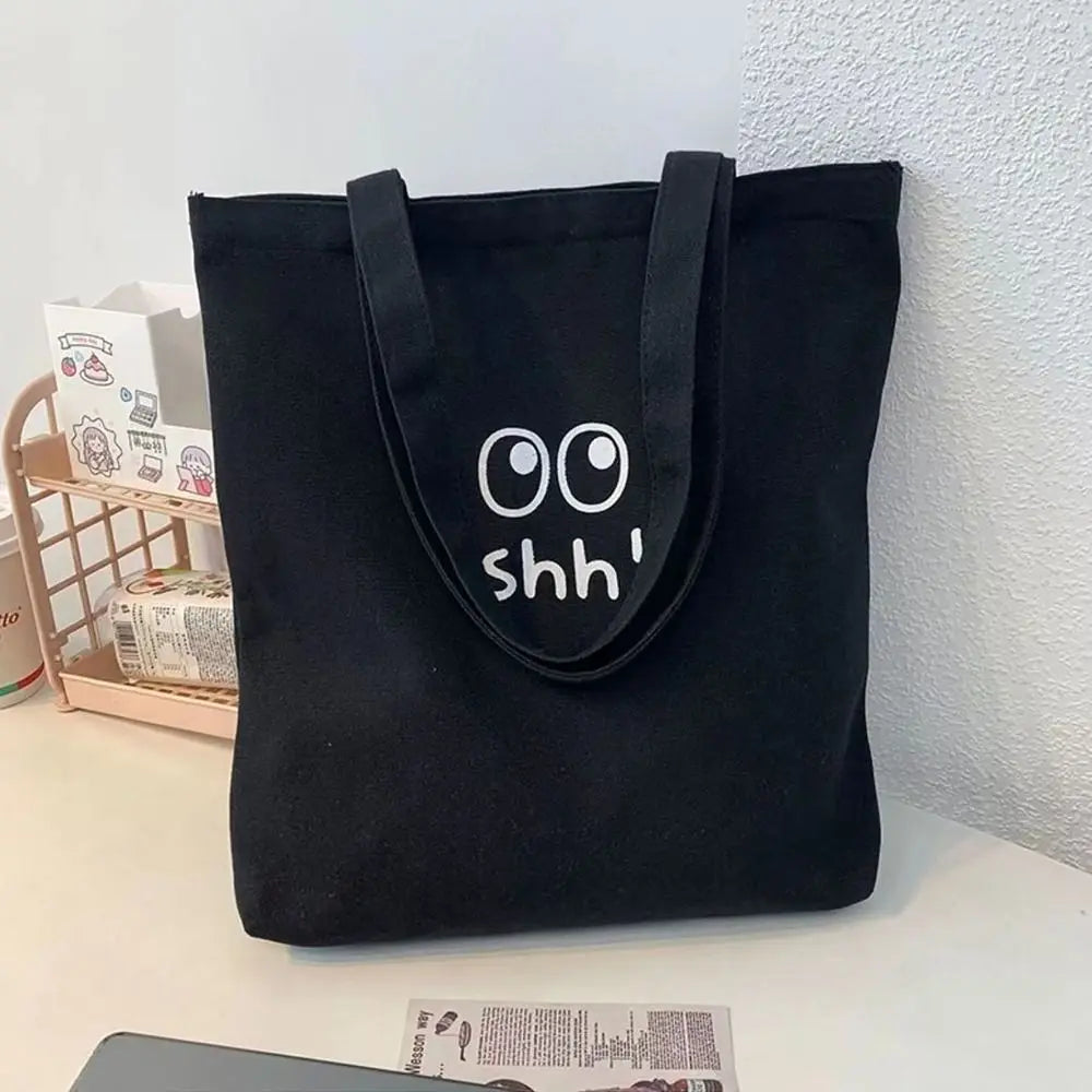 sac main toile dessin animé yeux grands ouverts shh décontracté noir beige doux