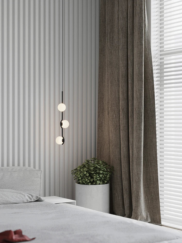 suspension lumineuse moderne sphères blanches structure noire led neutre lumière blanc noir