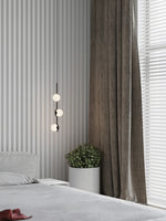 suspension lumineuse moderne sphères blanches structure noire led neutre lumière blanc noir