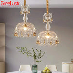 lampe suspendue dorée cristal transparent classique élégante chambre salle manger véranda