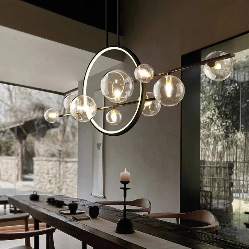 suspension lumineuse moderne noir boules transparentes scandinave chaînes suspendues interrupteur poussoir lumière salon cuisine